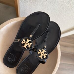 Tory Burch Black Sandals with Gold Logo Medallions